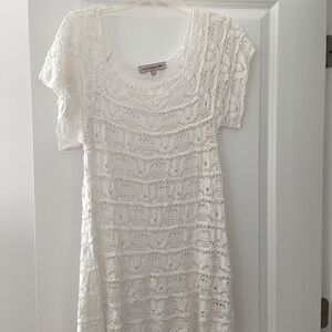 Off-the-shoulder lace swimsuit coverup.